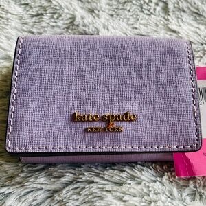 Gorgeous Kate Spade mini trifold wallet.